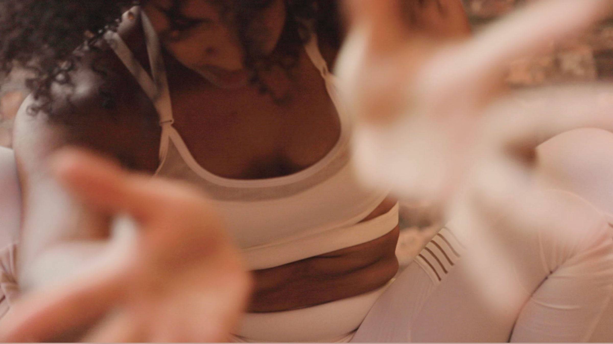 Hands in motion, warm light