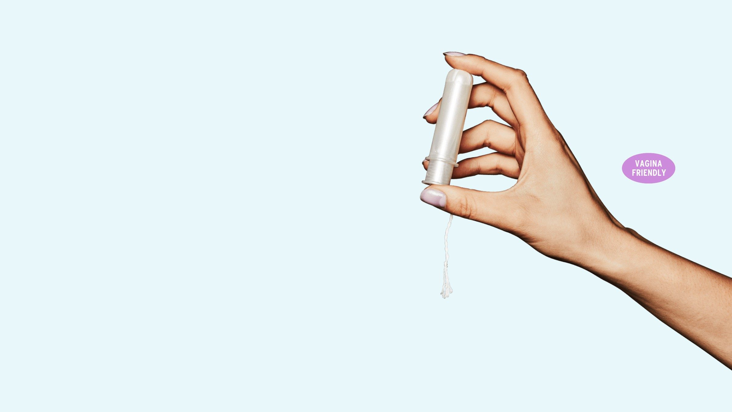 Tampon in hand, Vagina Friendly badge